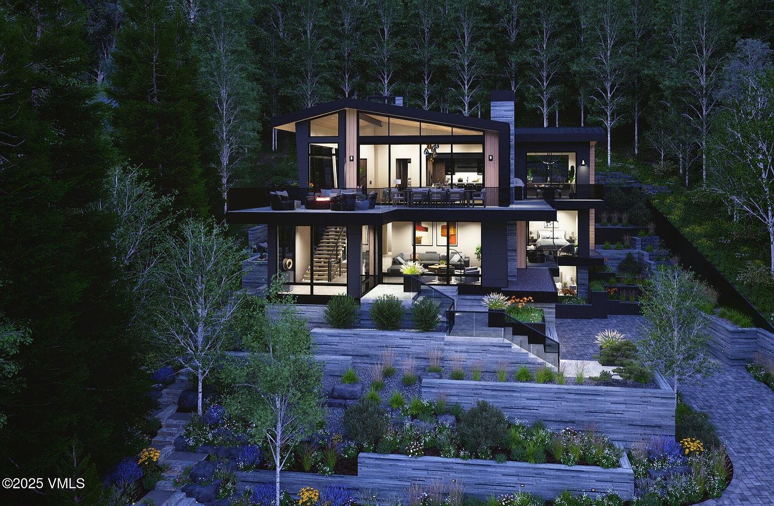 This is a stunning front view of a modern, multi-level home nestled in a lush, wooded area. The house features large glass windows and doors, allowing for ample natural light and showcasing the interior spaces. The exterior is complemented by beautifully landscaped terraces and gardens, creating a serene and inviting atmosphere.