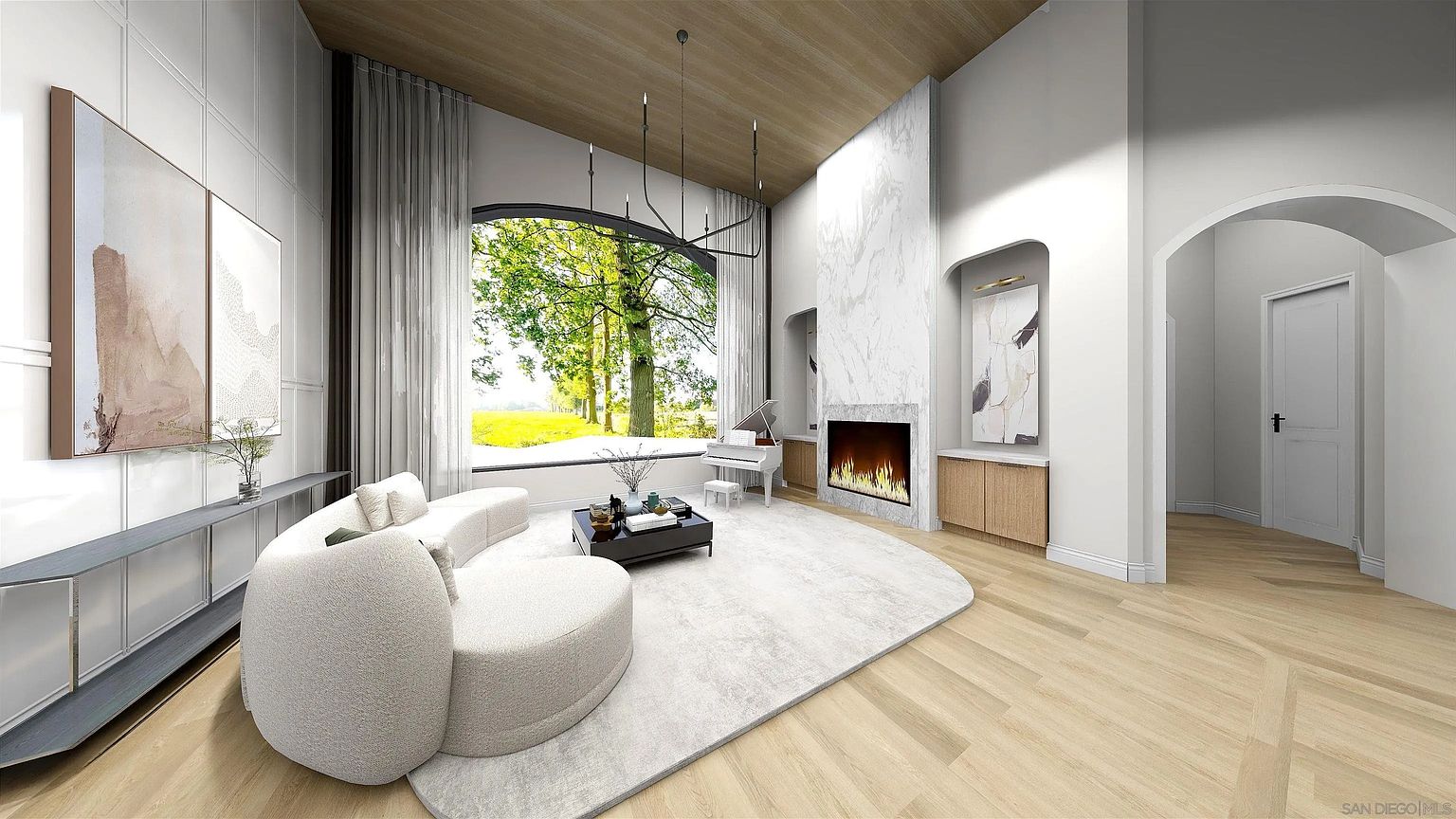 This is a spacious and luxurious living room featuring a curved white sofa, a modern fireplace with a marble surround, and a grand piano. A large arched window provides ample natural light and a view of the outdoors. The room is decorated in a minimalist style with light wood floors and neutral colors, creating a serene and elegant atmosphere.