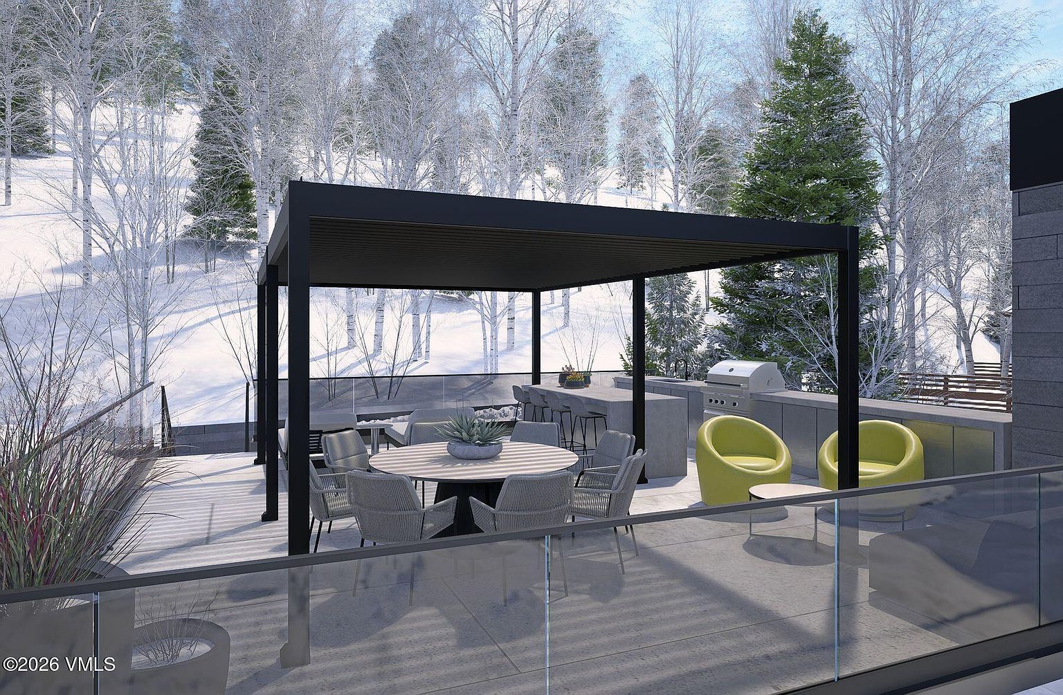 This modern outdoor terrace features a covered dining area with a round table and woven chairs, positioned beneath a sleek black pergola. An adjacent outdoor kitchen includes a built-in grill and a concrete bar counter with stools, all set against a backdrop of snow-covered trees. The space is enclosed by a glass railing, offering a clear, elevated perspective of the wintry landscape.