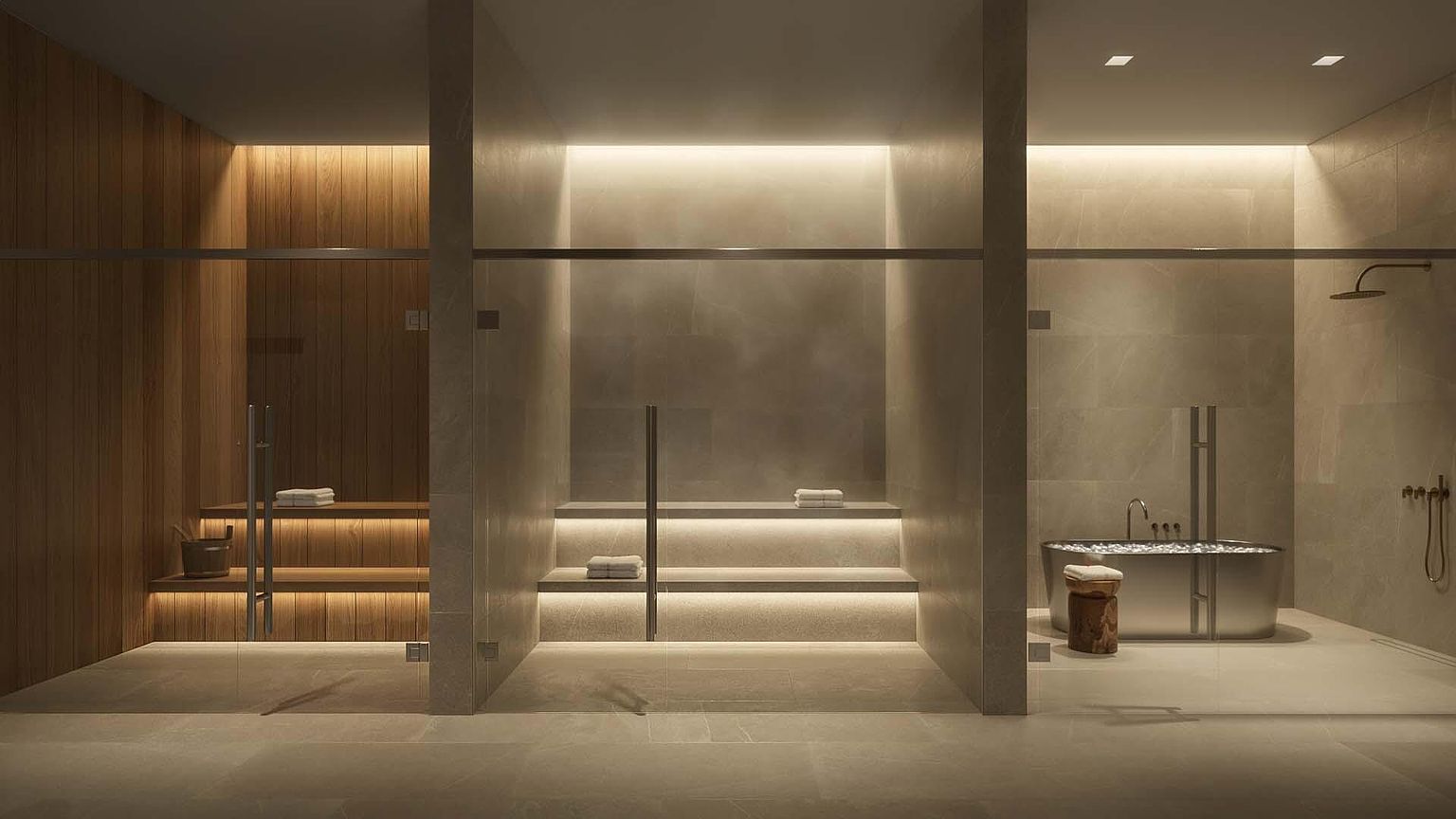 This image showcases a luxurious primary bathroom featuring a sauna, steam room, and a modern bathtub. The sauna is clad in warm wood, while the steam room and bath area feature sleek, neutral-toned tiles and glass enclosures. The lighting is soft and ambient, creating a spa-like atmosphere, and the perspective is from the entrance, showing all the amenities.