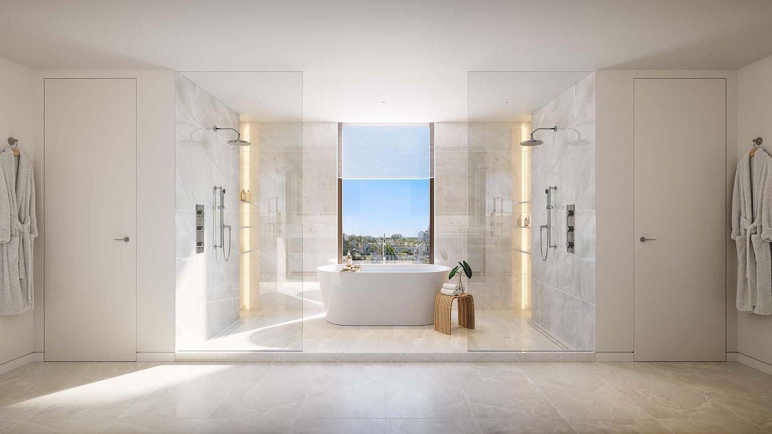 This is a luxurious primary bathroom featuring a freestanding bathtub positioned in front of a large window with a view. The bathroom includes dual walk-in showers with glass enclosures and marble-like tile, complemented by soft, ambient lighting. Two doors are on either side of the shower enclosures with robes hanging on the doors.