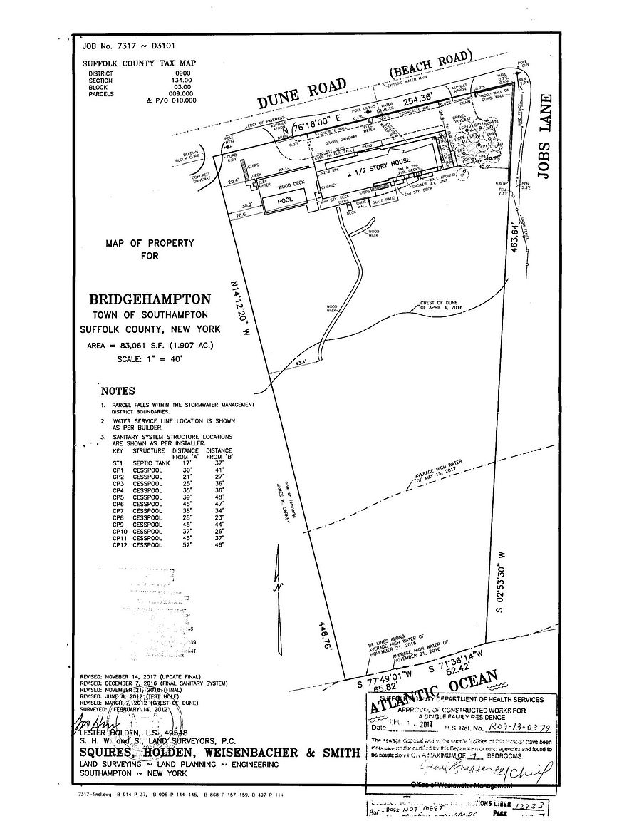 This image is a detailed land survey map for a property located in Bridgehampton, New York, showing the layout of the lot, the 2 1/2 story house, pool, and deck. The document includes technical specifications such as property dimensions, tax map information, and the location of sanitary structures like cesspools. It provides a comprehensive overhead view of the parcel's boundaries, including its proximity to the Atlantic Ocean and local roads.