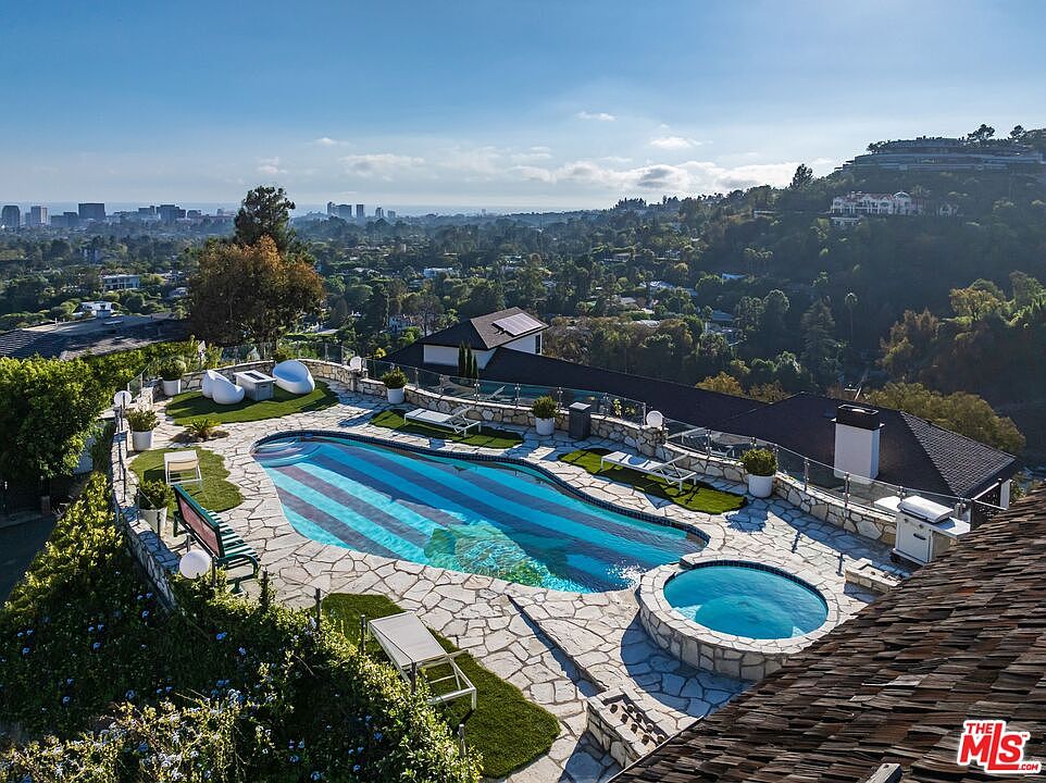 Architectural Promontory Estate with Panoramic City Views