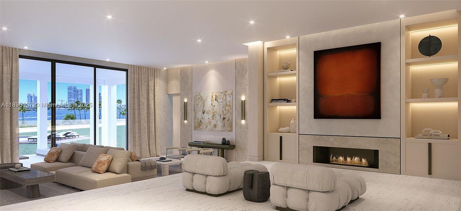 This is a luxurious living room featuring a neutral color palette with beige sofas and chairs, complemented by modern artwork and built-in shelving with accent lighting. A sleek fireplace adds warmth, while large windows offer a view of the outside. The overall impression is one of sophisticated comfort and contemporary design.