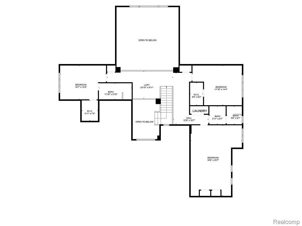 This image presents a detailed floor plan of a two-story house, showcasing the layout of rooms on the upper level. The plan includes bedrooms, bathrooms, a loft, laundry room, and walk-in closets, with dimensions clearly labeled for each space. The layout emphasizes an open design with 'open to below' areas, providing a sense of spaciousness.