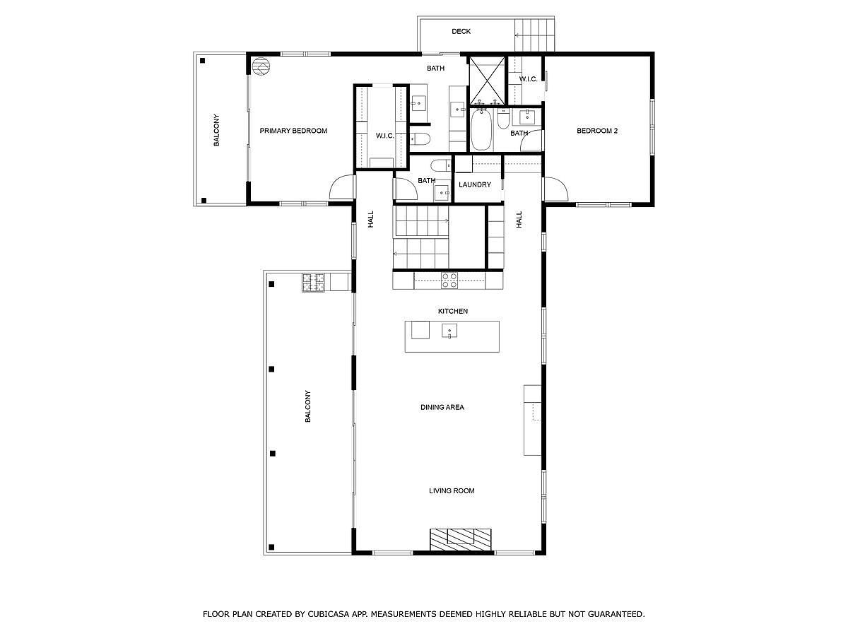 This is a floor plan of a house, showcasing the layout of rooms including the primary bedroom with a balcony, a second bedroom, bathrooms, a laundry room, a kitchen, a dining area, and a living room. The plan also indicates the presence of a deck and balconies, providing a comprehensive overview of the property's spatial arrangement and features.