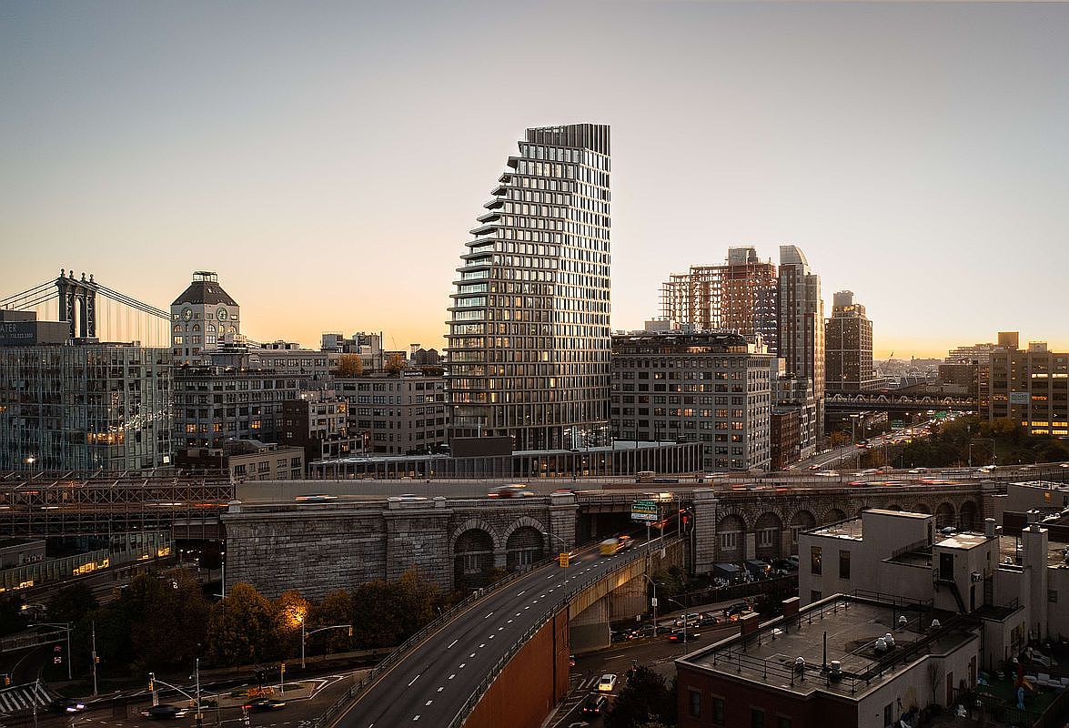 This cinematic aerial view captures a striking modern skyscraper with a unique stepped, terraced design rising above a dense urban landscape. The scene is set during the golden hour, highlighting the contrast between the contemporary glass architecture and the historic stone bridge infrastructure in the foreground. The composition provides a sweeping perspective of the city skyline, emphasizing the building's prominent position within the metropolitan environment.