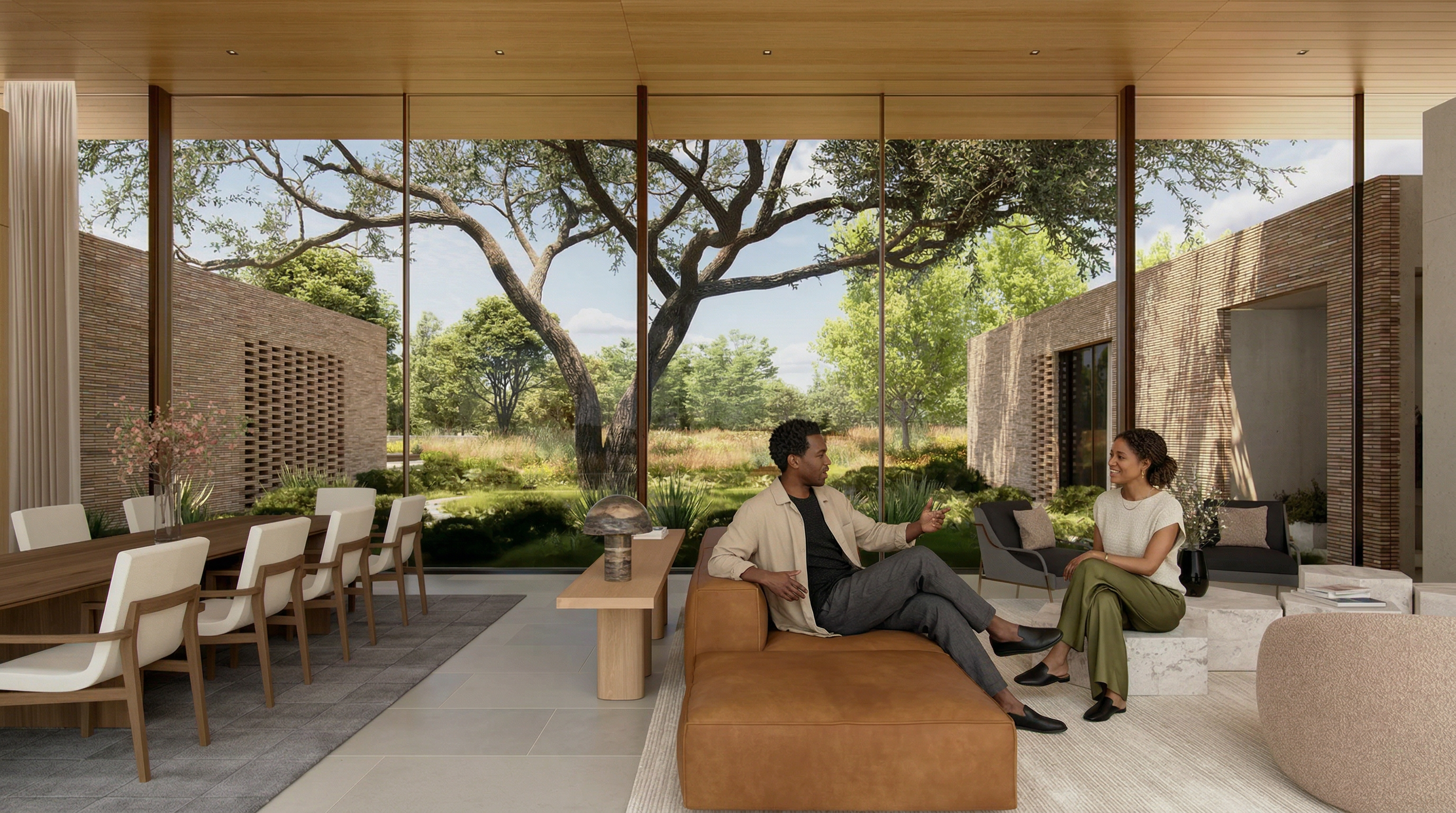 This modern open-concept living and dining area features floor-to-ceiling glass walls that provide seamless indoor-outdoor living with views of a naturalistic garden. The space is anchored by a low-profile leather couch and elegant wooden dining furniture, reflecting a minimalist, high-end organic aesthetic. The warm wood ceilings and subtle brick architectural textures create a serene, sophisticated atmosphere perfect for luxury relaxation.