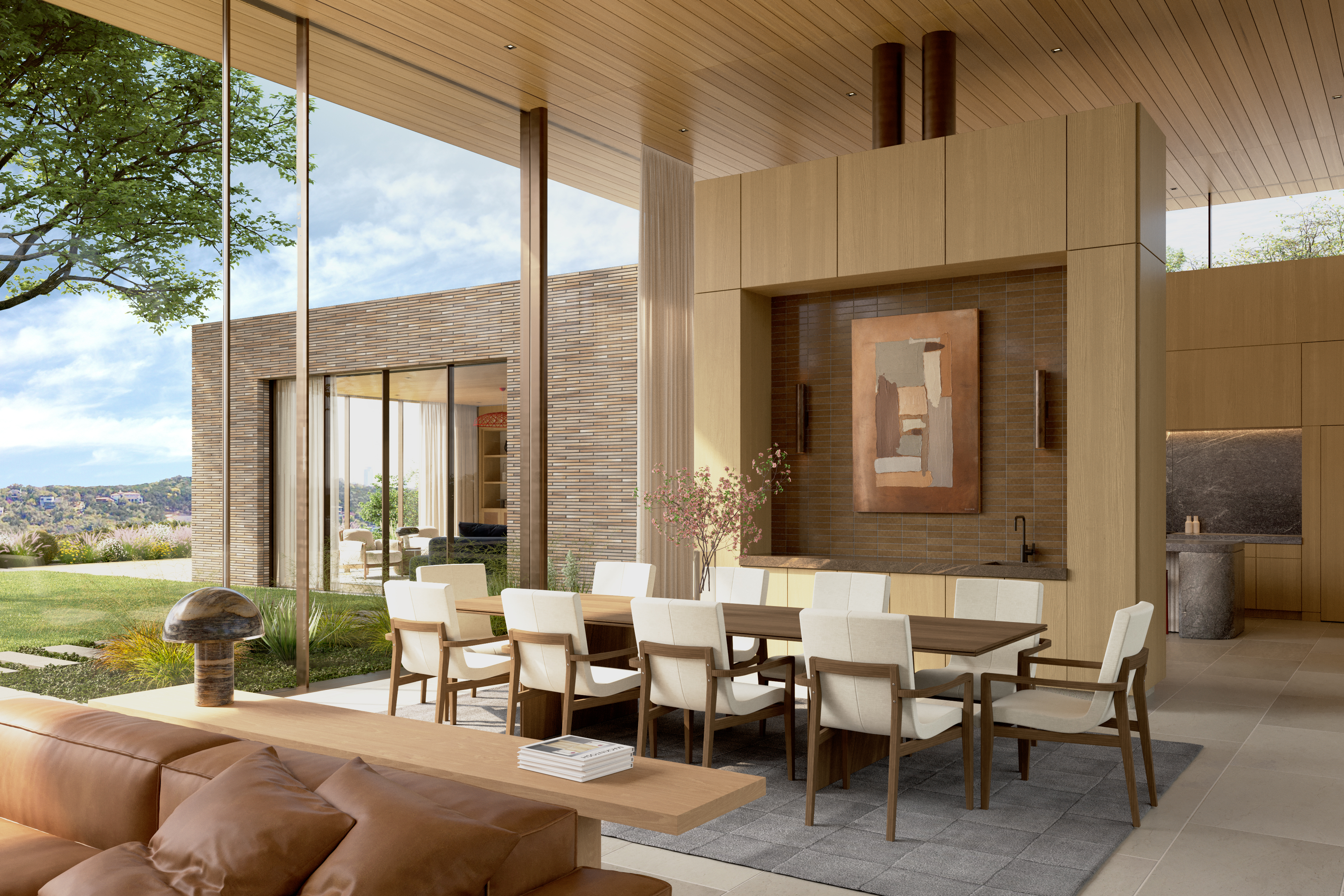 This sophisticated dining area features an open-concept layout with floor-to-ceiling windows that seamlessly connect the indoor space to the natural landscape outside. The room is anchored by a sleek wooden dining table surrounded by modern, upholstered chairs, set against a striking wood-paneled wall with recessed artwork and integrated storage. The high-end design, natural materials, and abundant light create an elegant, airy atmosphere perfect for luxury entertaining.