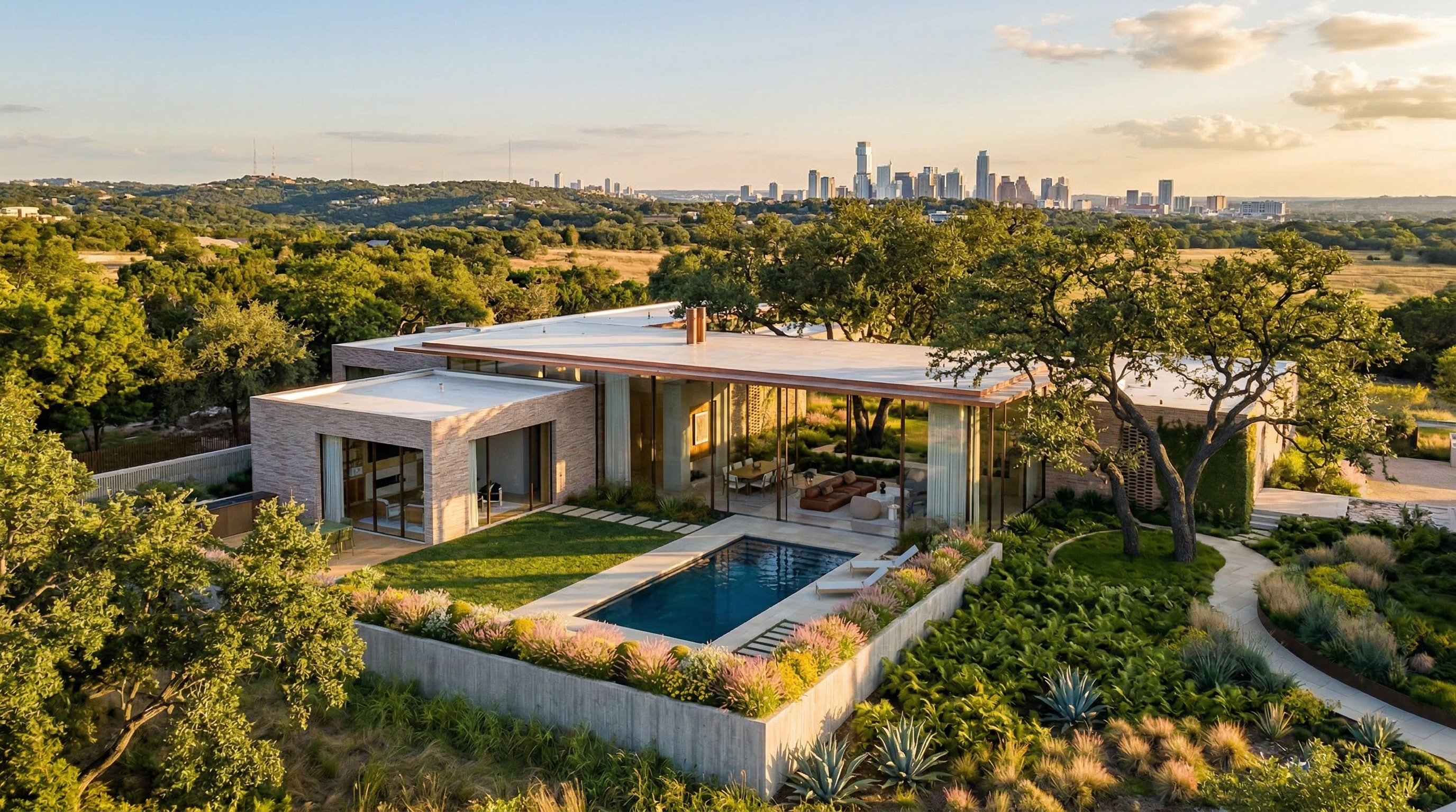 This stunning contemporary residence features a seamless blend of indoor and outdoor living with floor-to-ceiling glass walls, a private infinity-edge swimming pool, and pristine, tiered landscaping. The architectural design highlights a flat-roof structure with stone masonry, perfectly situated on a sprawling hillside estate that offers panoramic views of the city skyline. The property radiates a sophisticated, resort-like luxury, ideal for high-end real estate appeal.