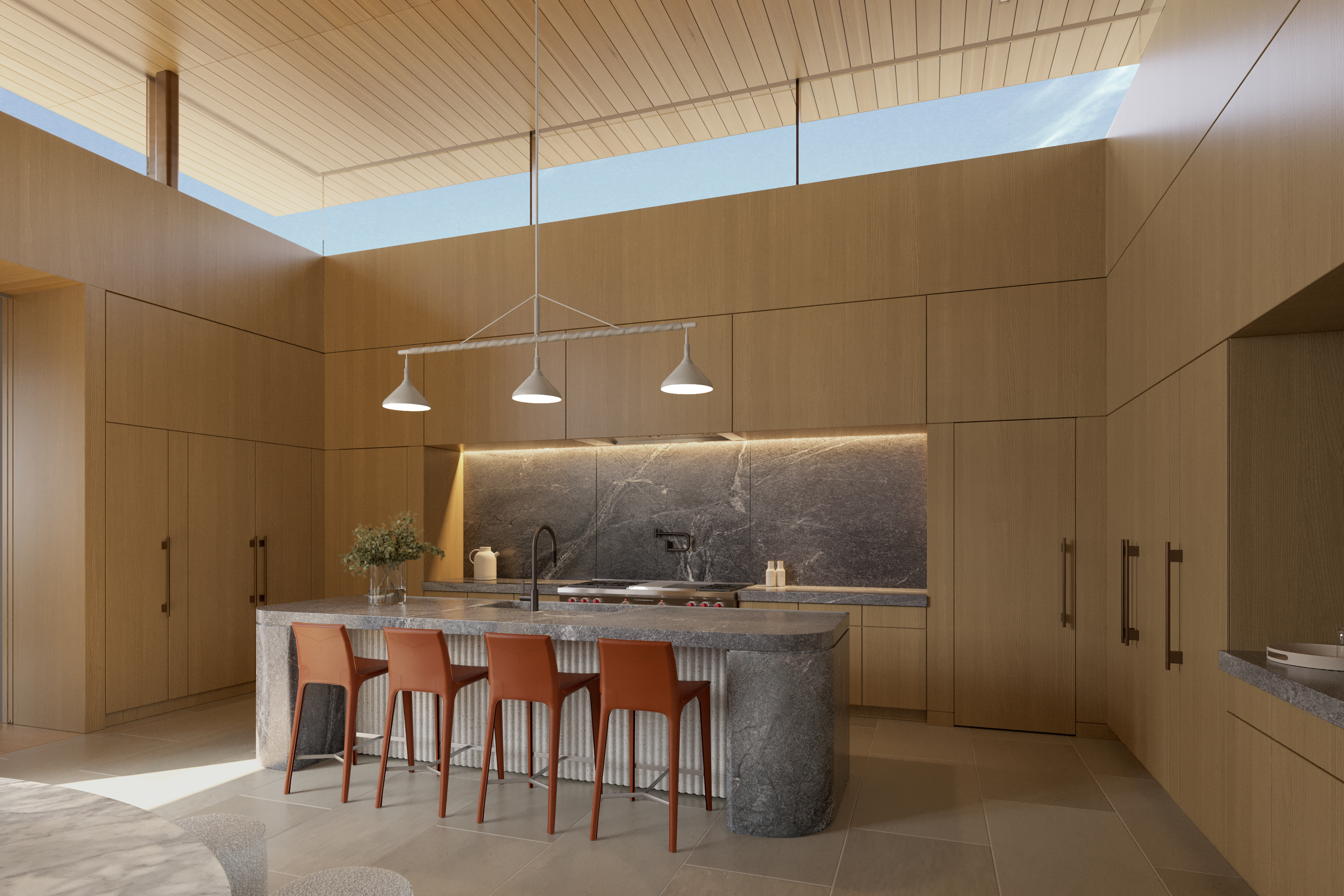 This stunning contemporary kitchen features high ceilings with clerestory windows that flood the space with natural light, highlighting the warm wood-paneled cabinetry and integrated storage solutions. The central focal point is a large stone-topped island with rounded ends and ribbed detailing, complemented by four modern orange-tone stools. A dark marble backsplash with ambient under-cabinet lighting adds a sophisticated contrast, creating an overall atmosphere of refined luxury and architectural elegance.