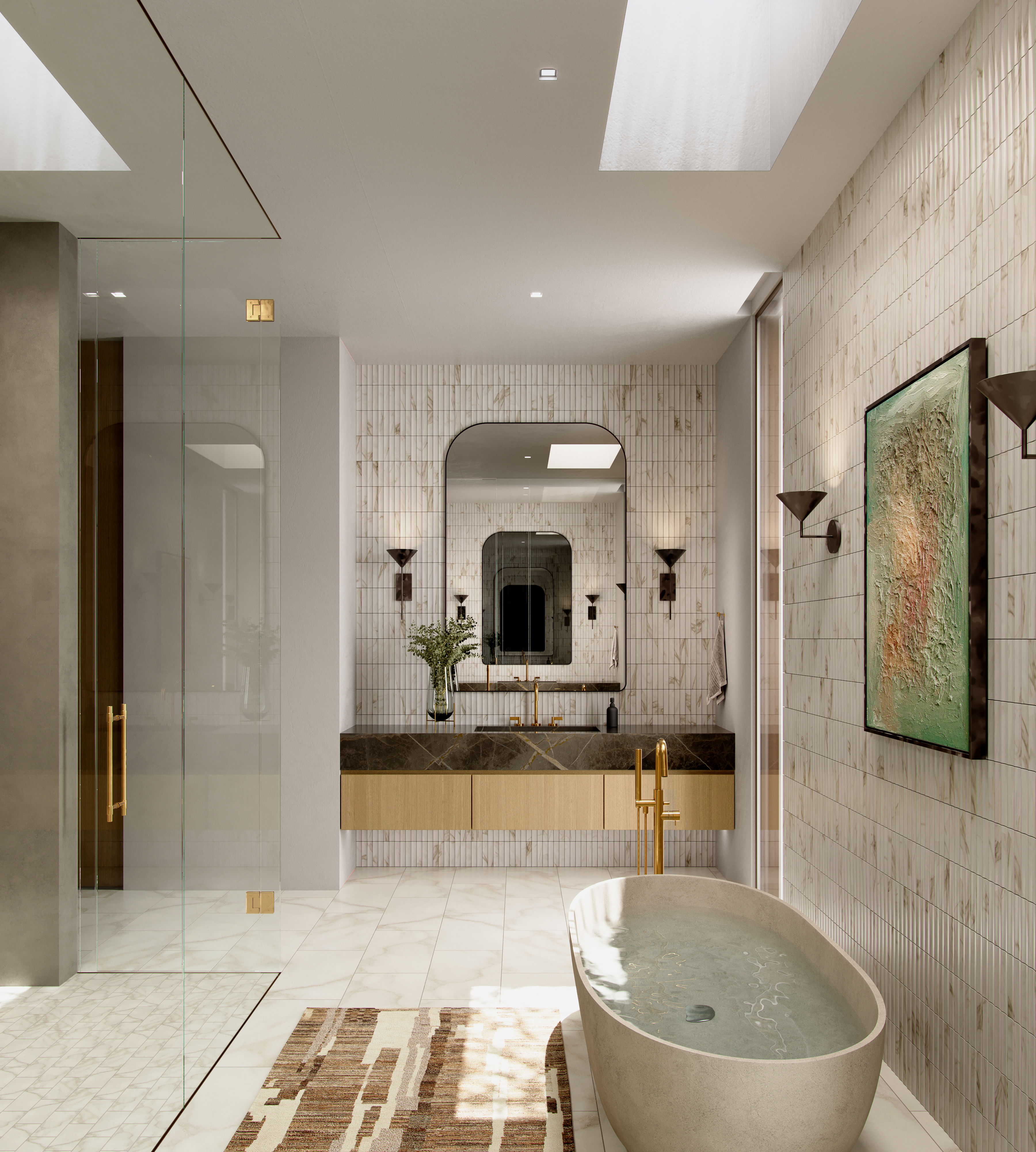 This luxurious modern primary bathroom features a stone soaking tub, a floating dual-sink vanity with brass fixtures, and a spacious glass-enclosed shower. The space is accented by vertical tile wall textures, warm wood cabinetry, and a textured piece of wall art, all illuminated by natural light from dual skylights. Its sophisticated design and high-end materials create a serene, spa-like sanctuary.