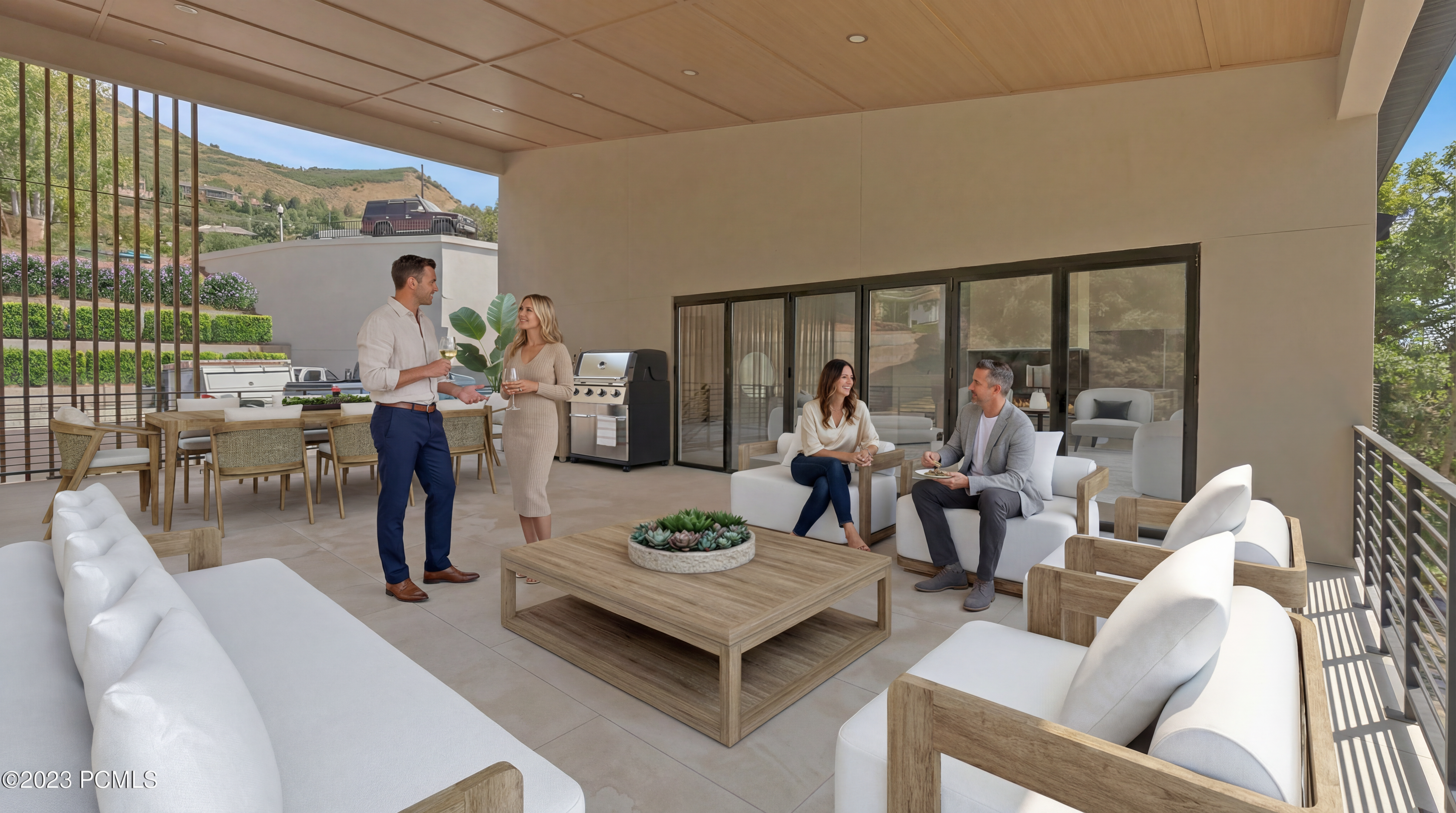 This image showcases a modern outdoor living space, specifically a patio or balcony area. The space is furnished with comfortable seating arrangements, a stylish coffee table, and a dining set, creating an inviting atmosphere for relaxation and entertaining. A built-in grill suggests outdoor cooking capabilities, while the overall design emphasizes a seamless transition between indoor and outdoor living.