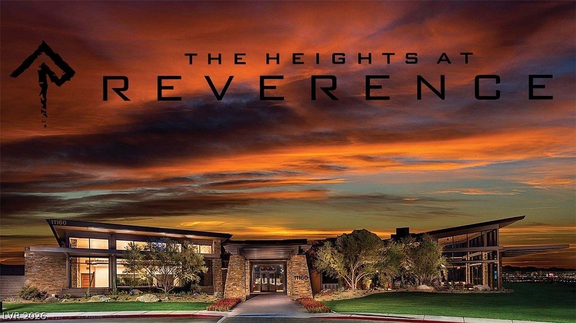 This image showcases the clubhouse at 'The Heights at Reverence' during a stunning sunset. The modern architecture features natural stone accents, large floor-to-ceiling windows, and a sophisticated, inviting entrance. The landscaping is well-manicured, highlighting a premium community facility.