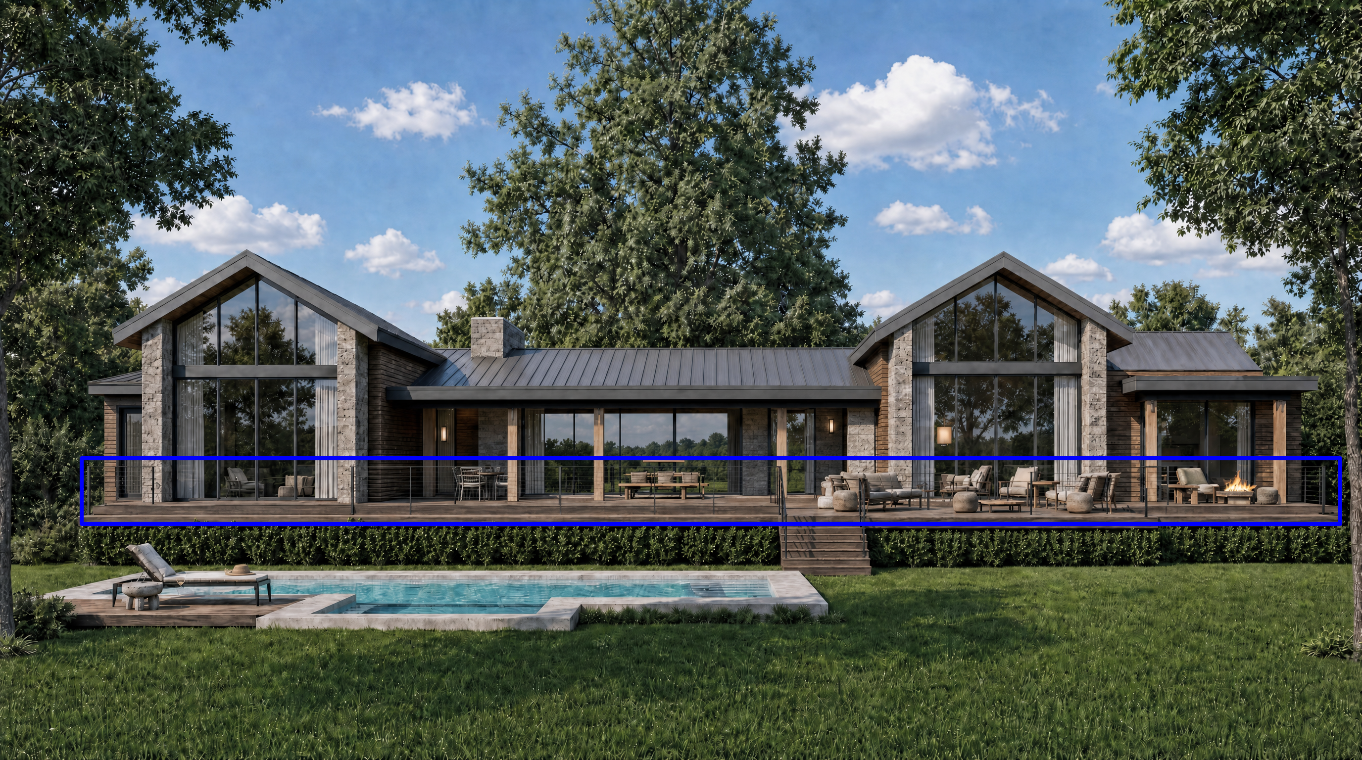 This stunning contemporary residence showcases an extensive rear deck spanning the length of the building, featuring a seamless blend of natural stone, wood siding, and large glass windows. The outdoor living space includes multiple seating areas and a fire feature, overlooking a picturesque swimming pool and manicured lawn. The design emphasizes indoor-outdoor living, perfect for entertainment and luxury relaxation.