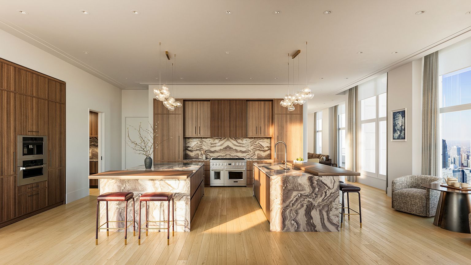 This sophisticated, high-end kitchen features double oversized marble islands and warm wood cabinetry that creates a luxurious, cohesive aesthetic. The space is well-lit by modern globe pendant lights and floor-to-ceiling windows, highlighting the premium appliances and natural wood flooring. With its expansive layout and sleek finishes, this kitchen presents a perfect blend of functionality and high-design, ideal for upscale urban living.
