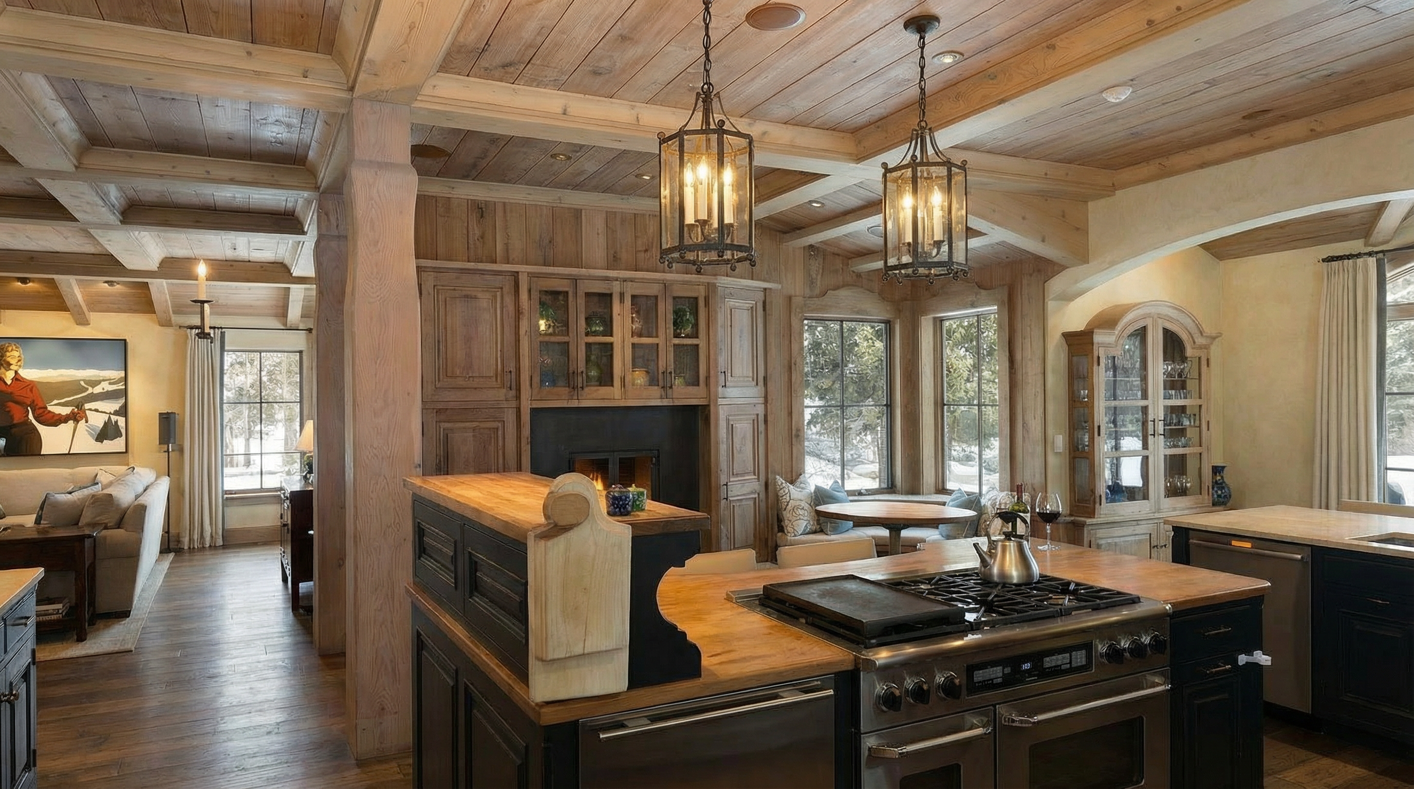 This is a well-lit kitchen featuring warm wood cabinetry and a rustic-chic style. It is equipped with a large cooking range. The kitchen opens to a living area, providing an open-concept living space.