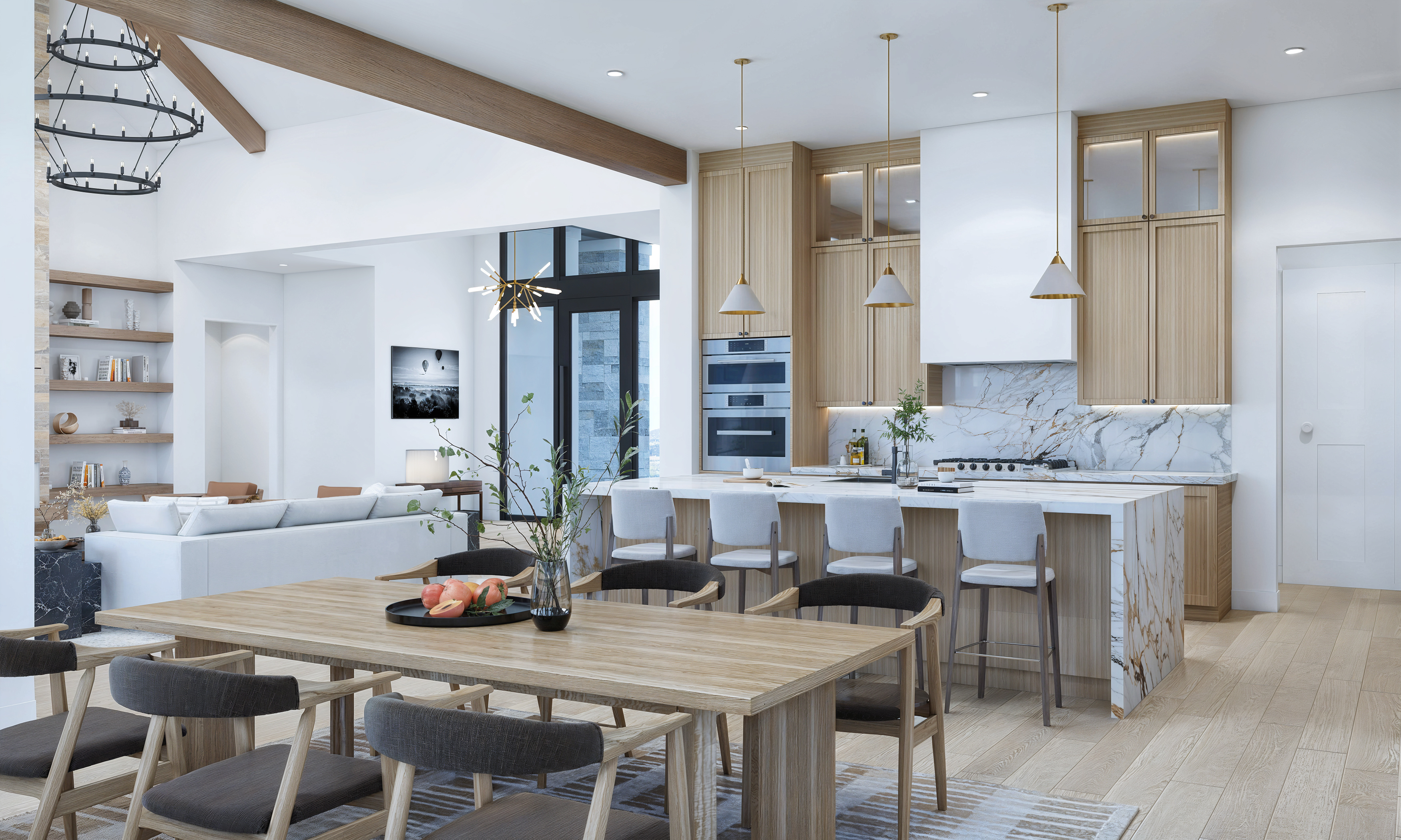 This interior shot showcases a modern open-concept kitchen and dining area. The kitchen features light wood cabinetry, marble countertops and backsplash, and stainless steel appliances. A large wooden dining table with upholstered chairs anchors the space, complemented by light wood flooring and stylish lighting fixtures, creating a bright and inviting atmosphere.