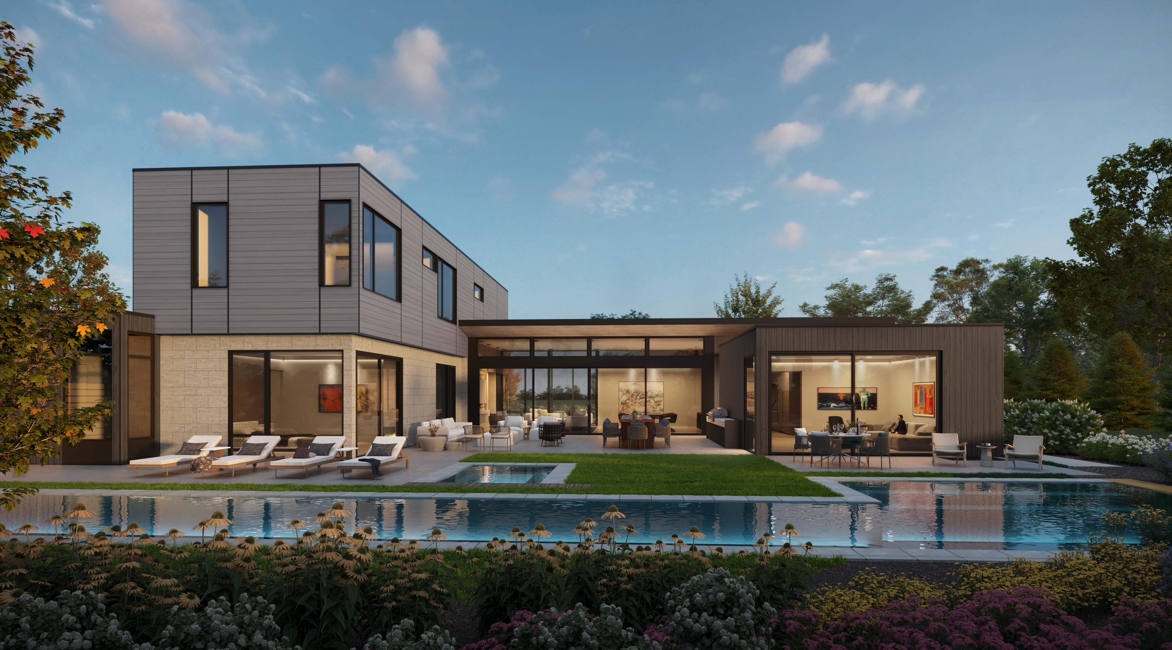 This stunning contemporary residence showcases a seamless blend of modern architectural materials, featuring horizontal wood siding, stone textures, and floor-to-ceiling glass walls. The rear exterior is expertly designed for luxury outdoor living, highlighted by a pristine rectangular swimming pool, integrated spa, and spacious stone patio areas furnished for relaxation and dining. Lush landscaping and vibrant floral borders frame the serene backyard, creating an inviting and sophisticated atmosphere perfect for high-end entertaining.