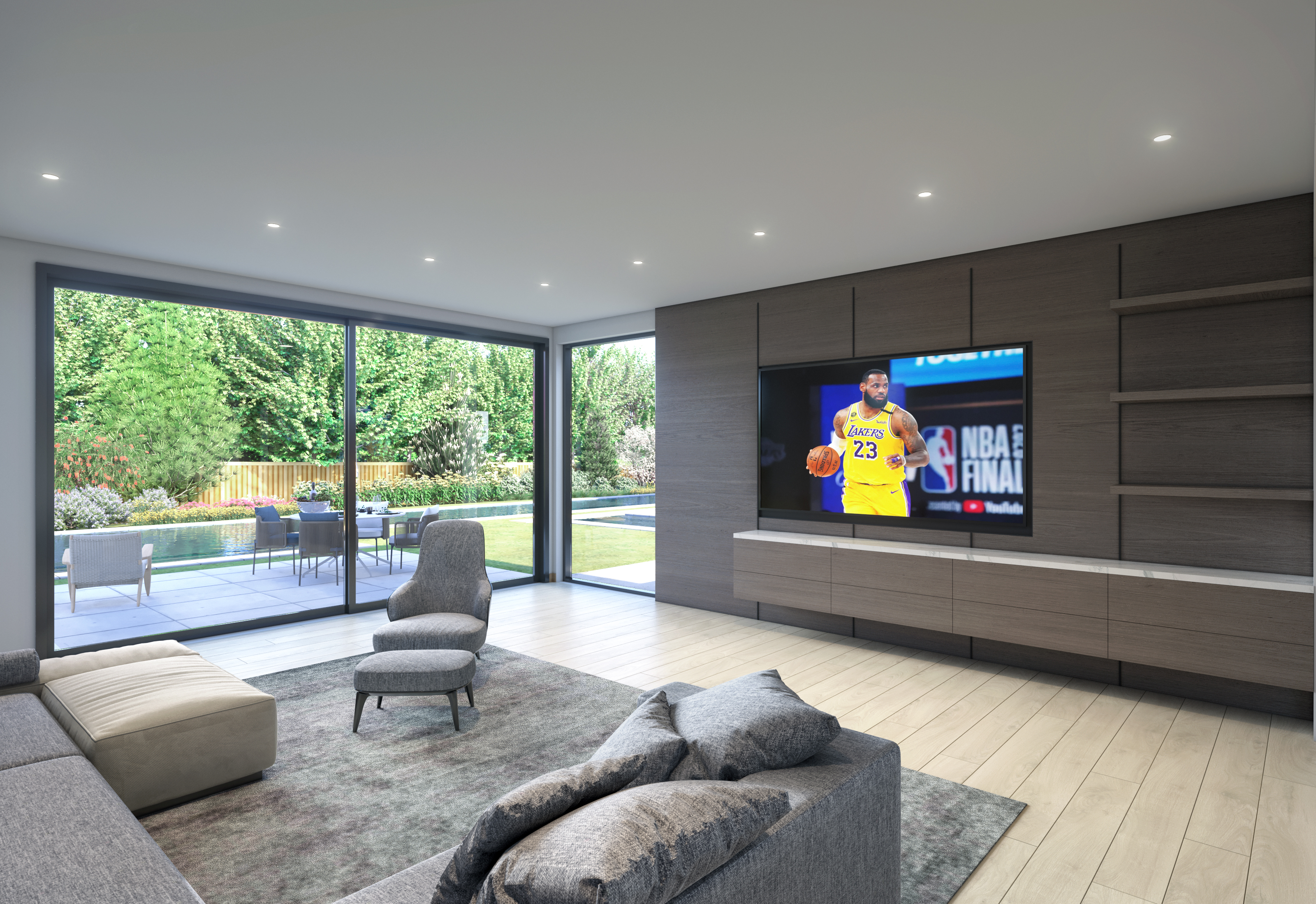 This modern, spacious living room features an open-concept design with floor-to-ceiling glass sliding doors that offer a seamless view of the outdoor patio and pool area. The room is anchored by a sophisticated dark wood accent wall with integrated shelving and a built-in media cabinet, complemented by light hardwood floors and a plush area rug. With its neutral color palette and clean lines, the space provides an elegant and comfortable environment perfect for relaxation or entertainment.