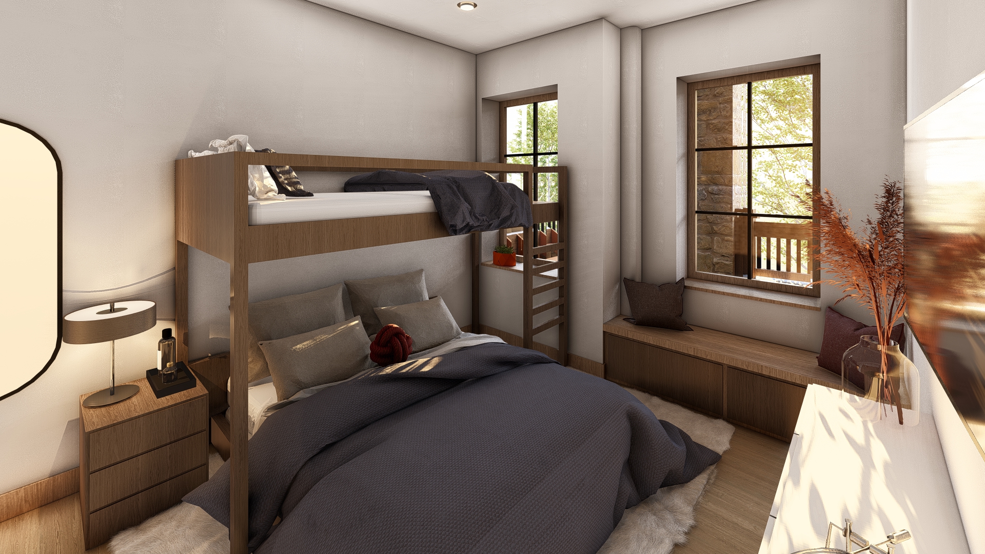 This is a cozy guest bedroom featuring a bunk bed with a double bed below, creating a versatile sleeping arrangement. The room is decorated in neutral tones with wood accents, providing a warm and inviting atmosphere. A built-in window seat offers additional storage and seating, enhancing the functionality and charm of the space.