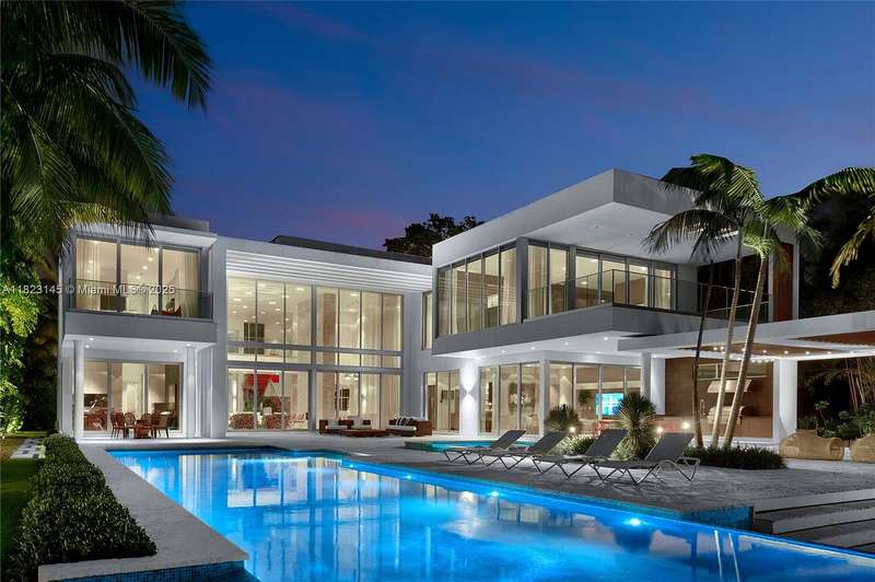 A Waterfront Masterpiece Redefined on Guard-Gated Palm Island