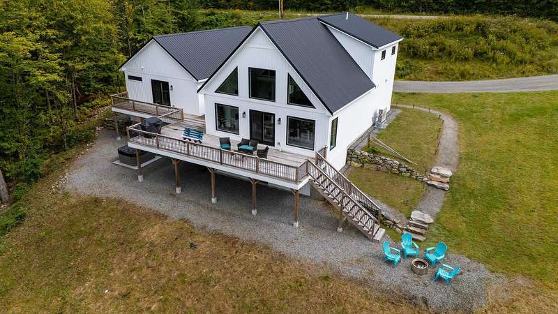 Contemporary Lakeside Retreat on Six Private Acres in Sugar Hill