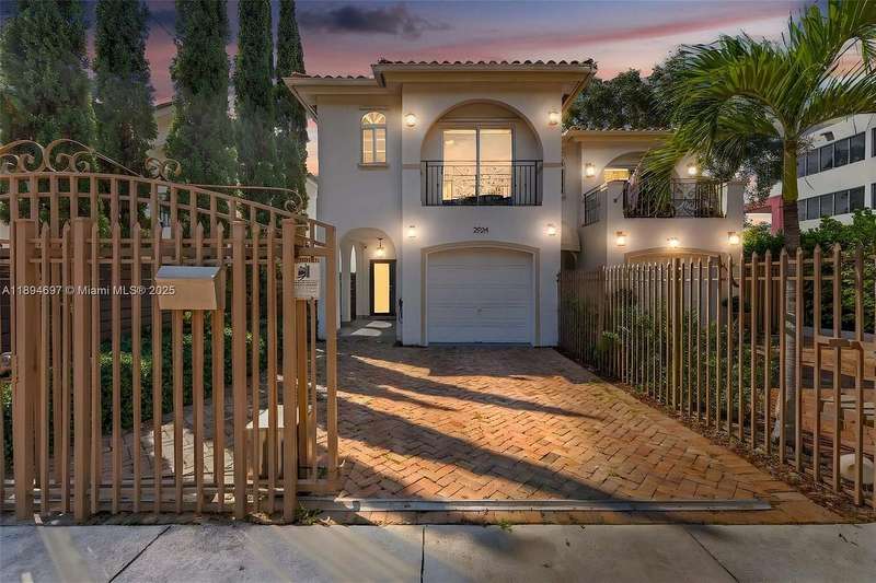 Reimagined Mediterranean Townhouse in Prestigious Coconut Grove