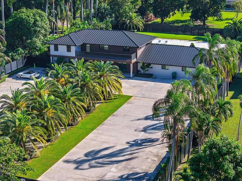 Masterfully Renovated Gated Estate in Prestigious Biscayne Gardens